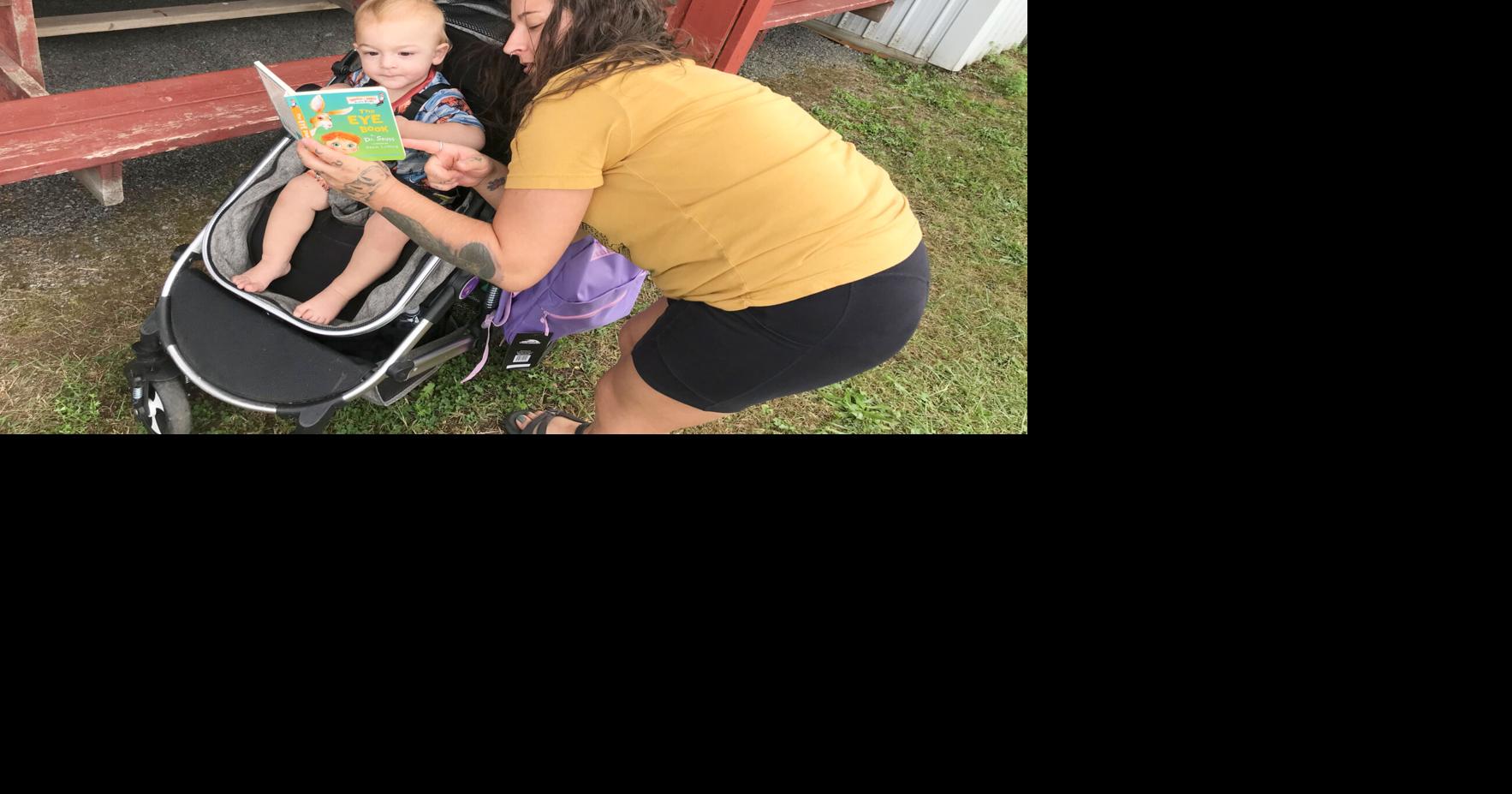 Lee Center giveaway provides backpacks, books to area students