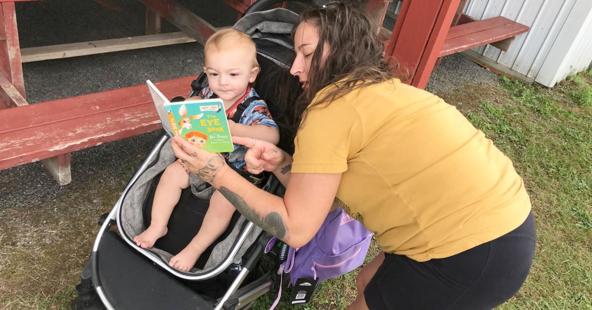 Lee Center giveaway provides backpacks, books to area students