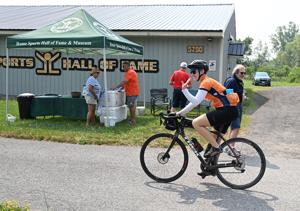 Smoky skies in Rome don't stop annual Erie Canal cyclists