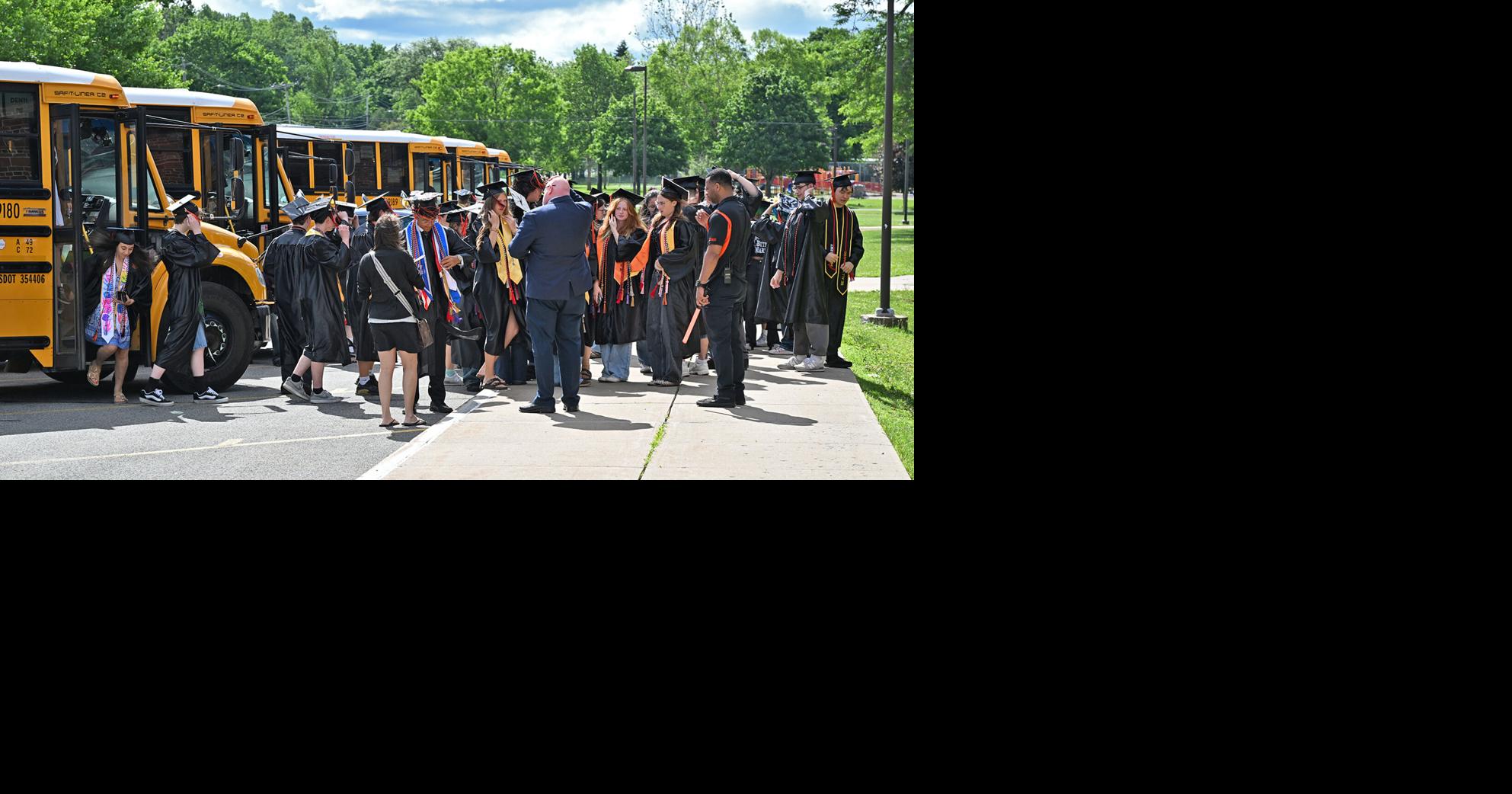 GRAD WALK GALLERY: See photos of RFA graduating seniors walk through city schools