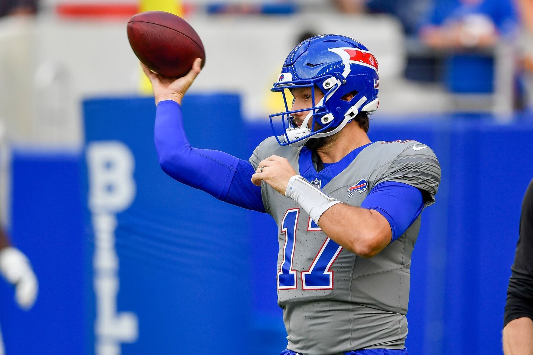 Josh Allen dropping back to pass for the Buffalo Bills offense