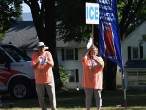Water, cheers and smiles at mile 5