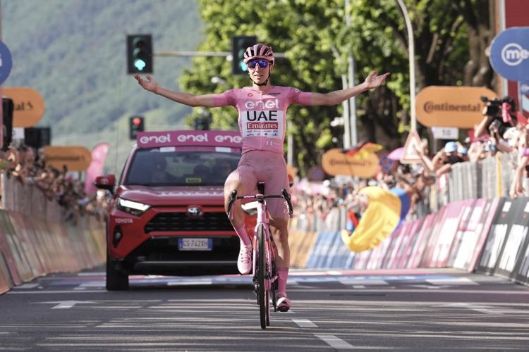 Pogacar all but wins Giro d'Italia on debut with another stunning stage