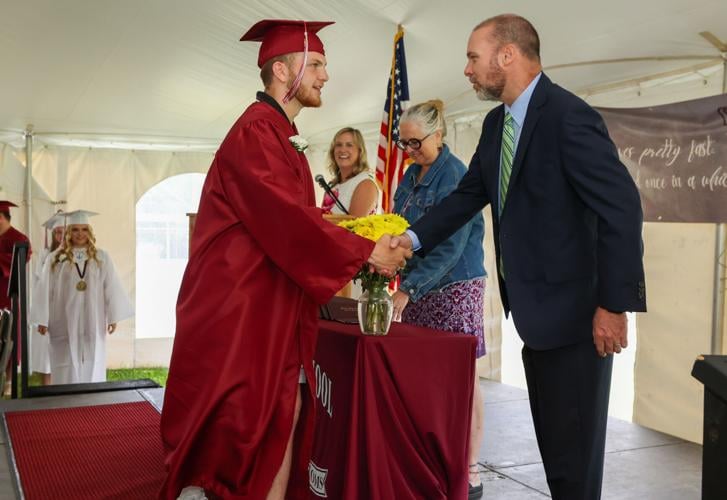 Proctor High School celebrates graduation in sunny outdoor ceremony