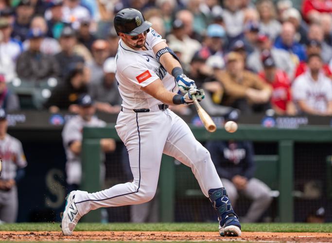 Mariners star catcher Cal Raleigh had hunch right oblique injury would ...