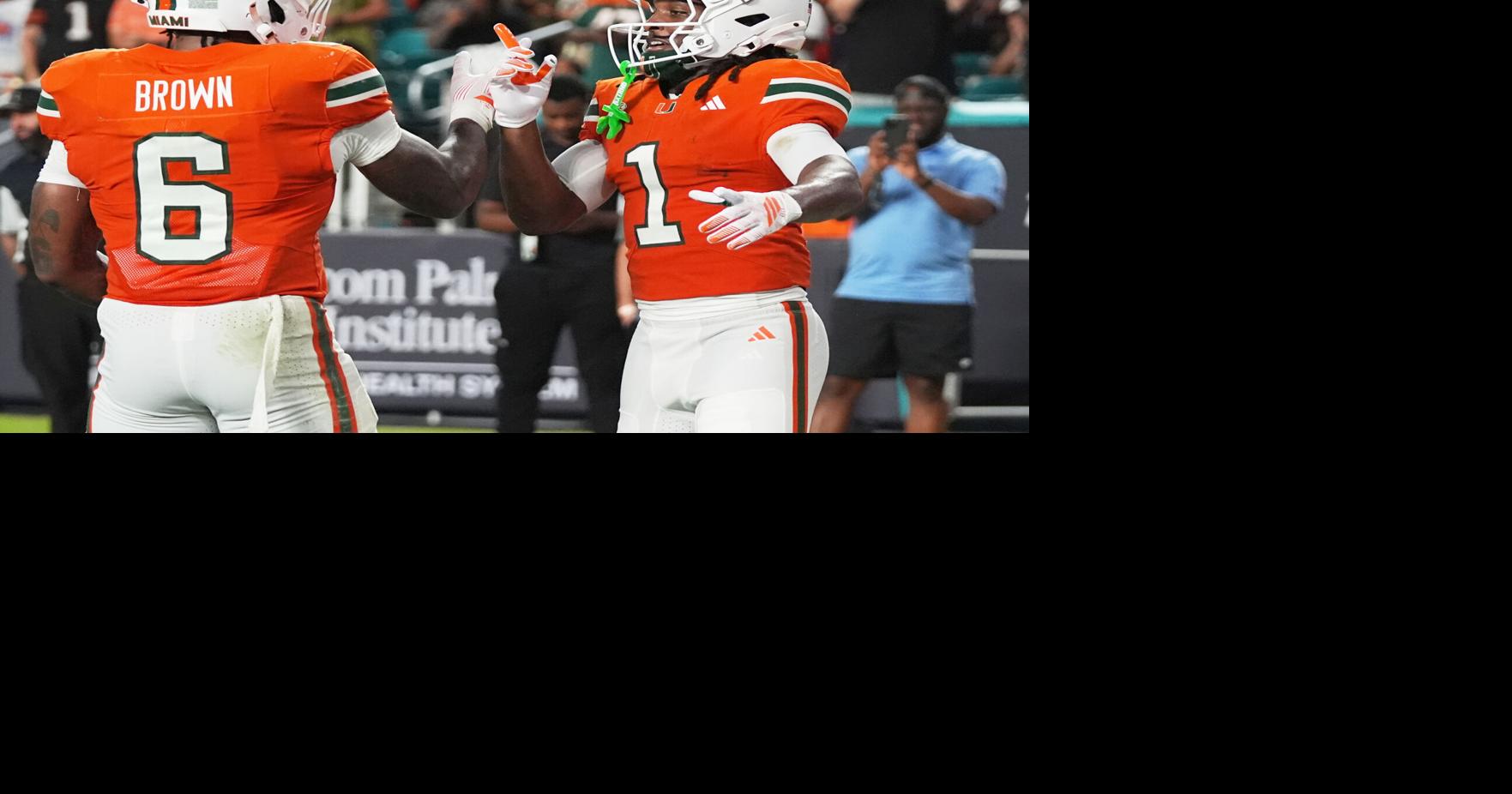 No. 7 Miami gains school-record 856 yards, rolls past Florida A&M 77-7
