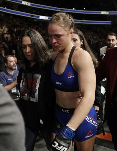 Retire or fight back? UFC stars offer advice to Ronda Rousey | |  
