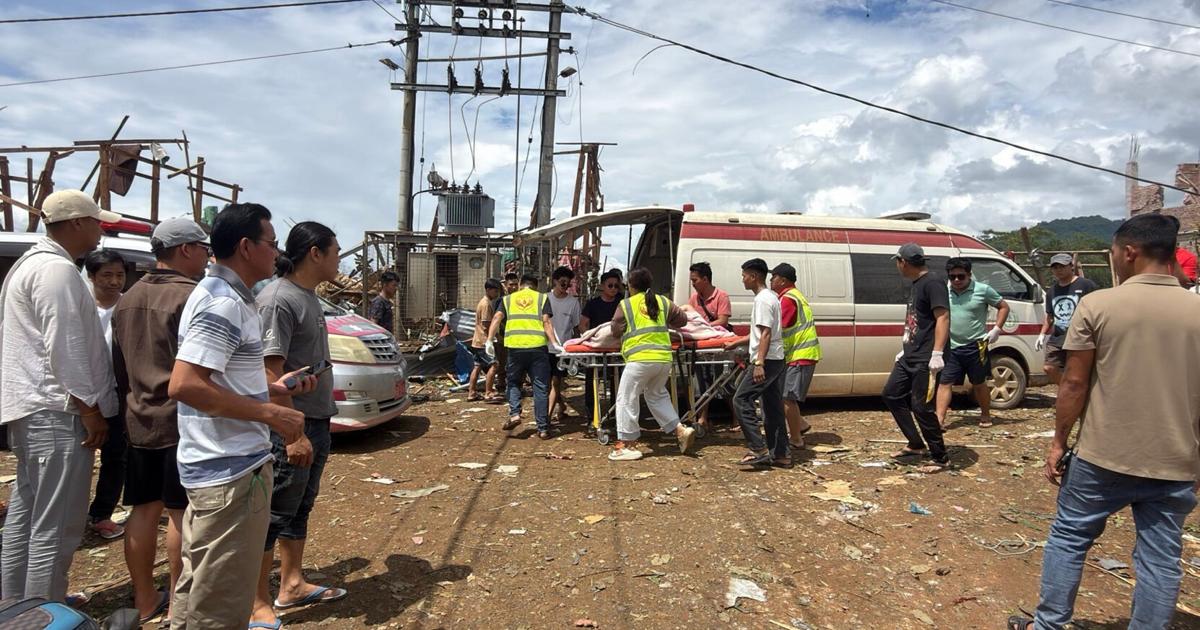 Rescuers dig for bodies after a mining explosives blast in Myanmar kills at least 43