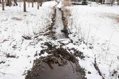Varian neighbors say stream has high levels of chemicals  