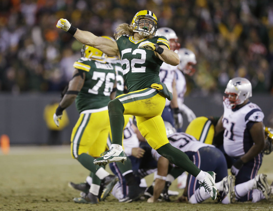 Green Bay Packers' Clay Matthews celebrates after the New England Patriots missed a field goal attempt during the second half.