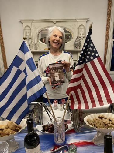 Stella Nahatis of Manchester-by-the-Sea holds her recently published ...