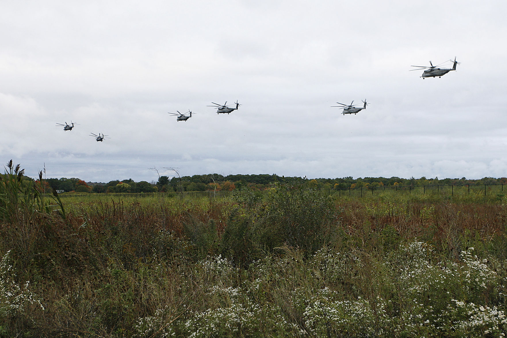 Squadron of Marines lands at Beverly Airport on way to Maine