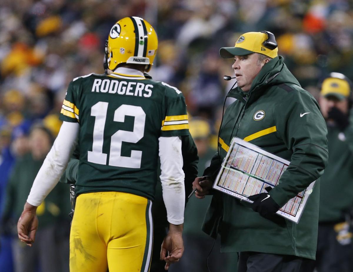 Green Bay Packers head coach Mike McCarthy and Aaron Rodgers during the second half.