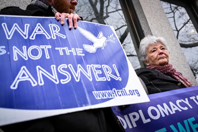 Massachusetts Peace Action members protest war in Ukraine outside Congressman Moulton’s office