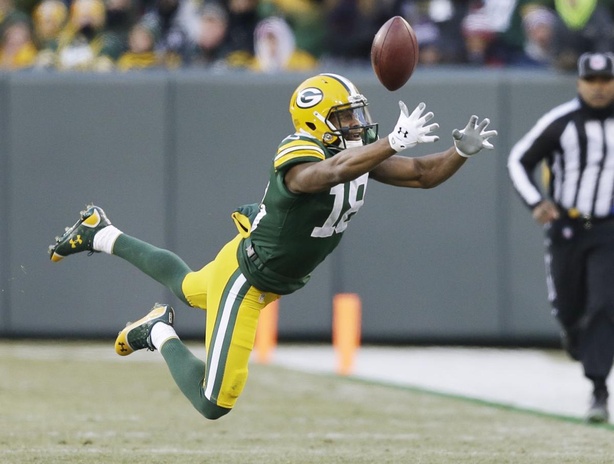 Green Bay Packers' Randall Cobb can't catch a pass during the first half.