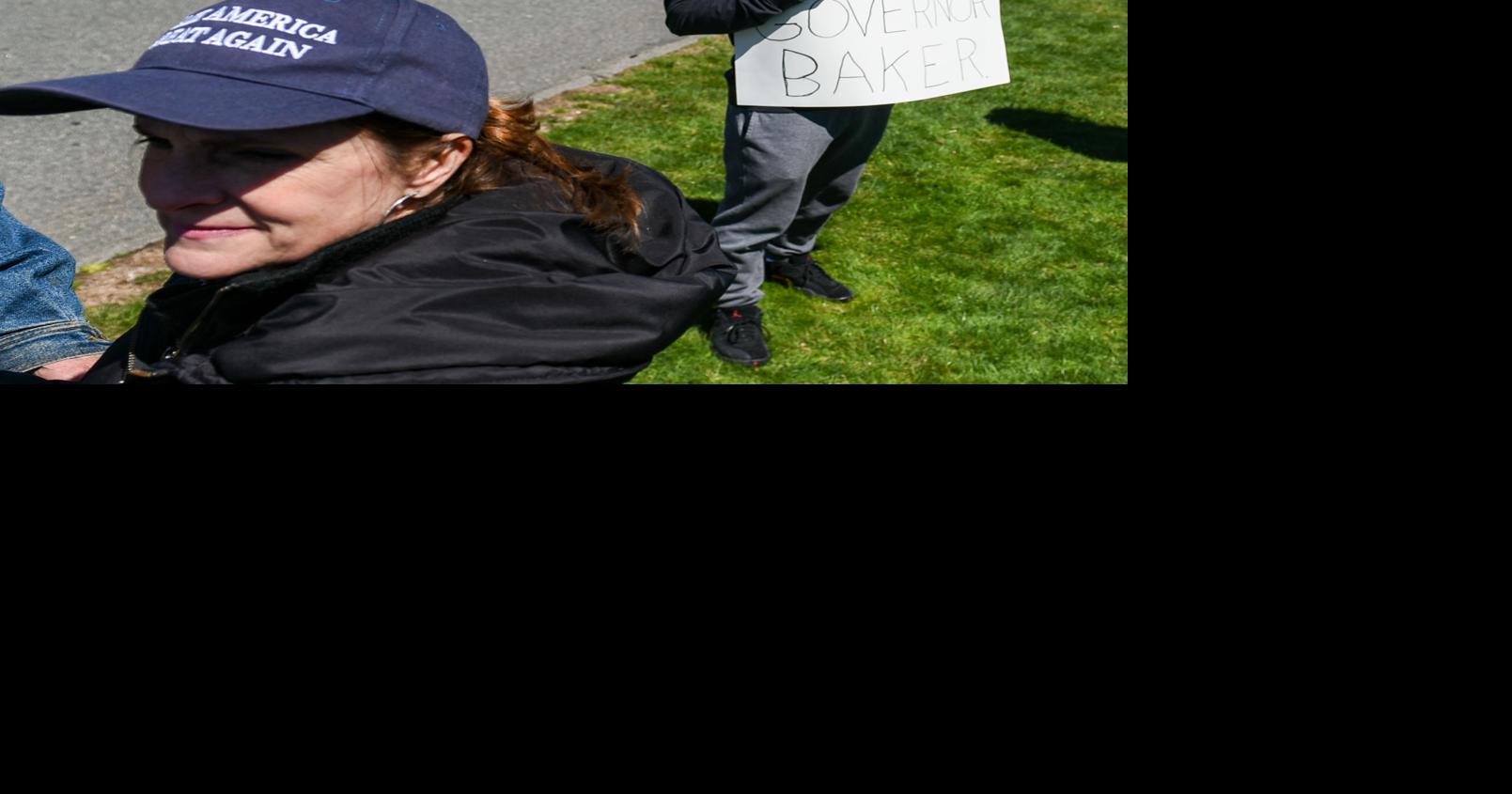 Protesters gather outside Gov. Charlie Baker's home in Swampscott