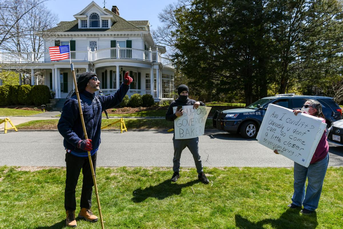Protesters gather outside Gov. Charlie Baker's home in Swampscott