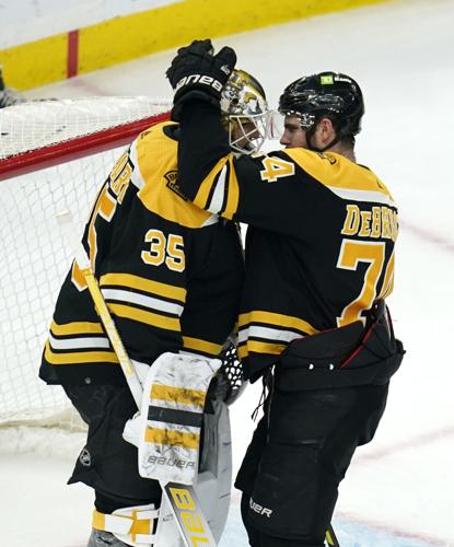 Boston Bruins Brad Marchand Jake Debrusk Brandon Carlo Hockey