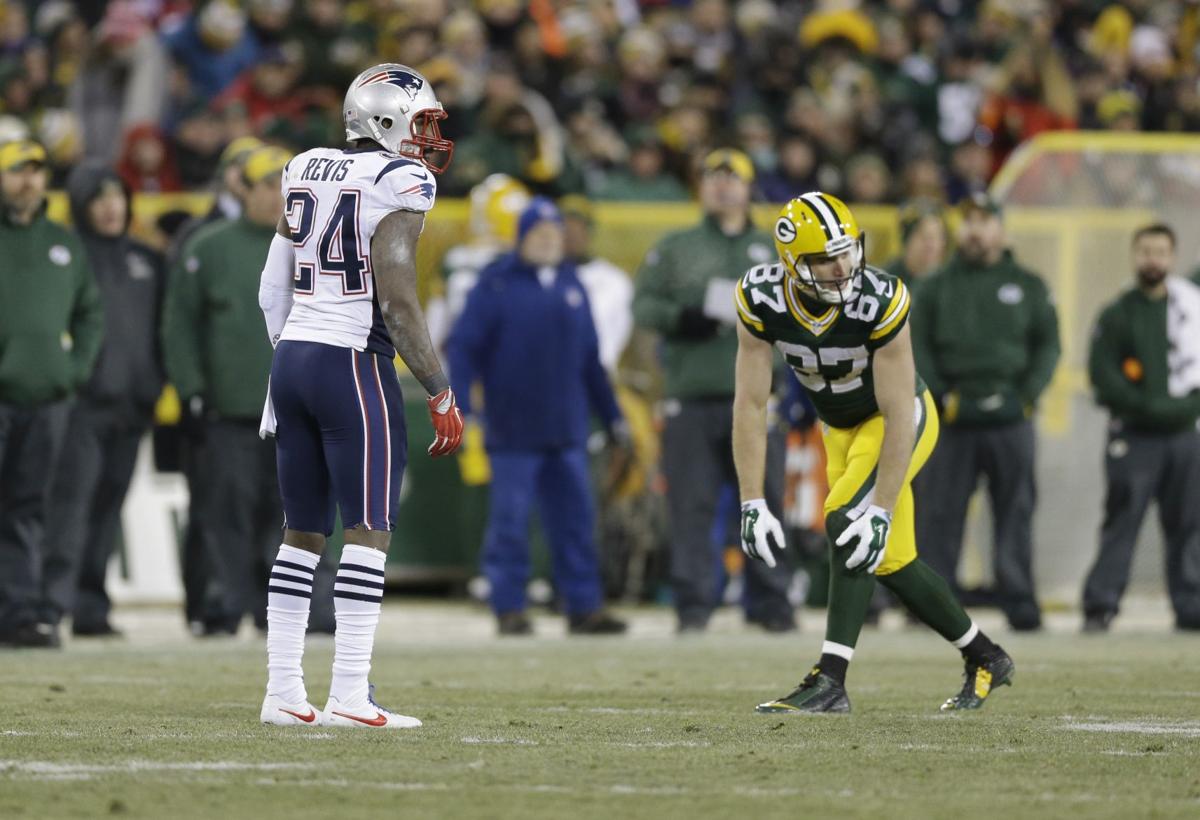 New England Patriots' Darrelle Revis (24) and Green Bay Packers' Jordy Nelson (87) line up during the second half.