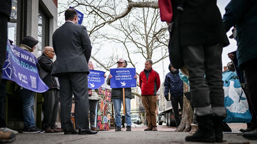 Massachusetts Peace Action members protest war in Ukraine outside Congressman Moulton’s office