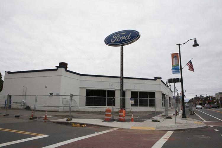 Dealership coming down to make way for apartments Local News