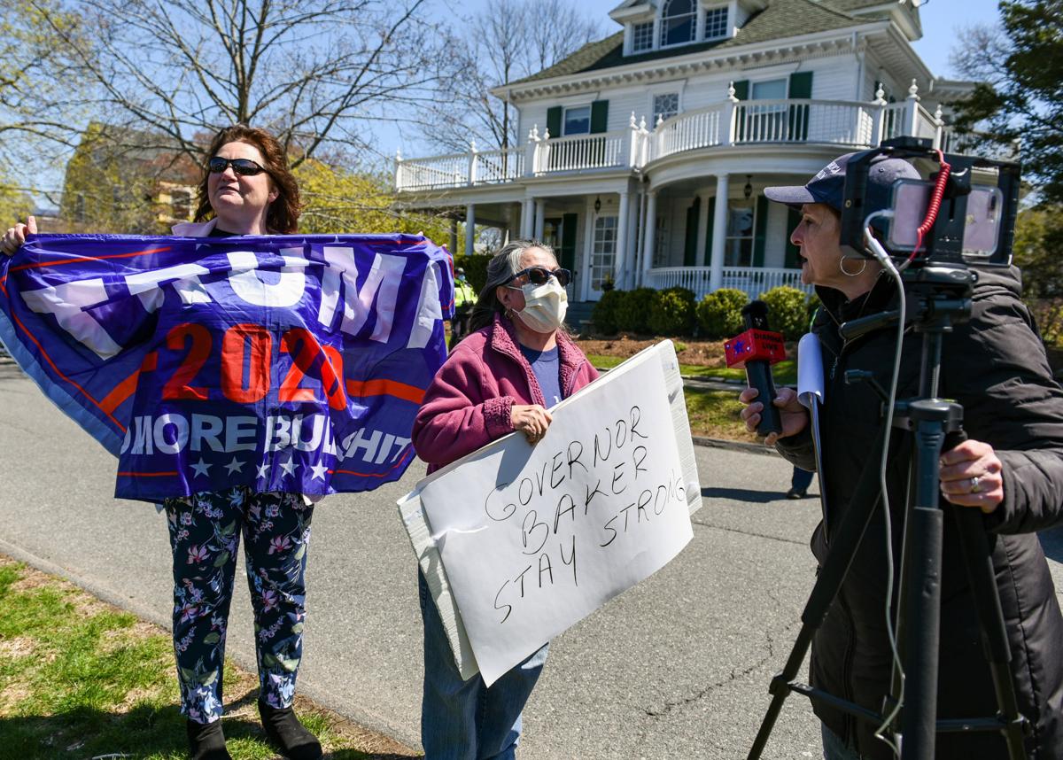 Protesters gather outside Gov. Charlie Baker's home in Swampscott