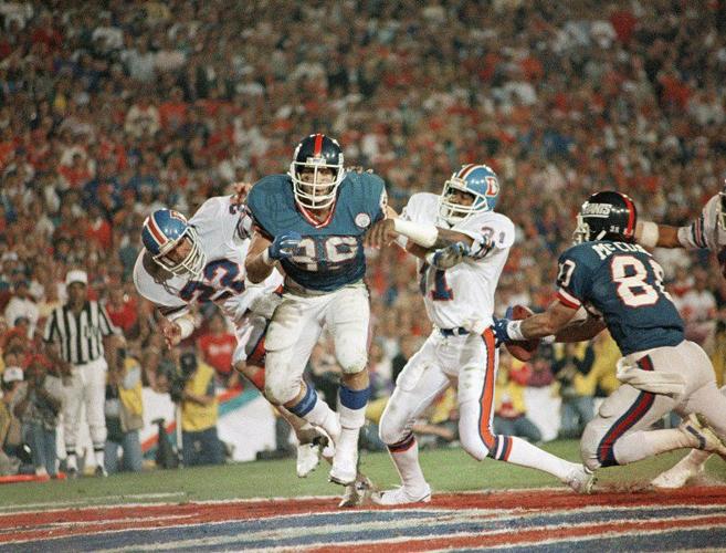 Mark Bavaro of the New York Giants looks on during an NFL football