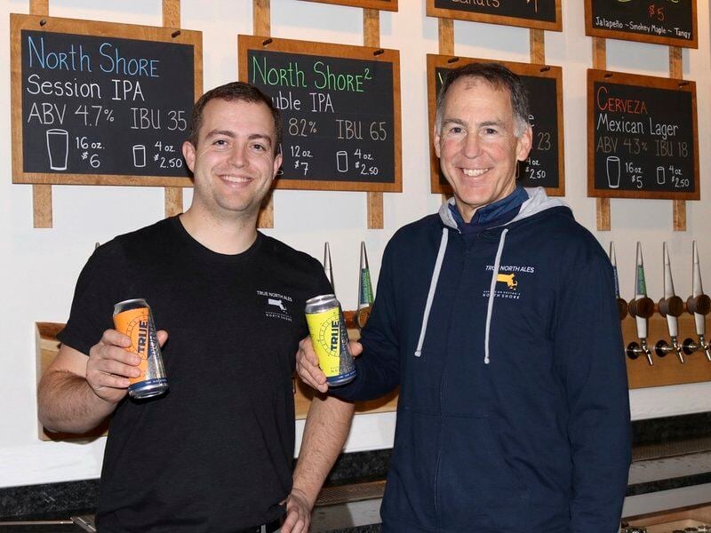 Jake and Gary Rogers with award-winning beers