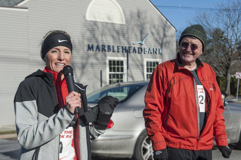 Three-time Olympian Shalane Flanagan of Marblehead and her dad Steve speak to a large crowd Saturday morning outside the Marblehead Community Center.