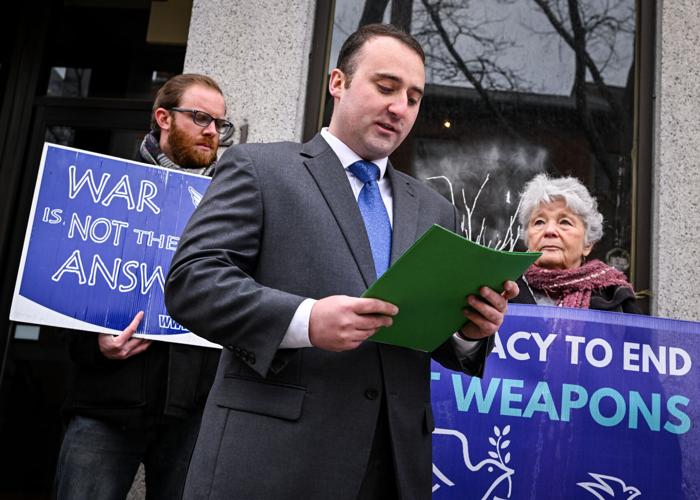 Massachusetts Peace Action members protest war in Ukraine outside Congressman Moulton’s office