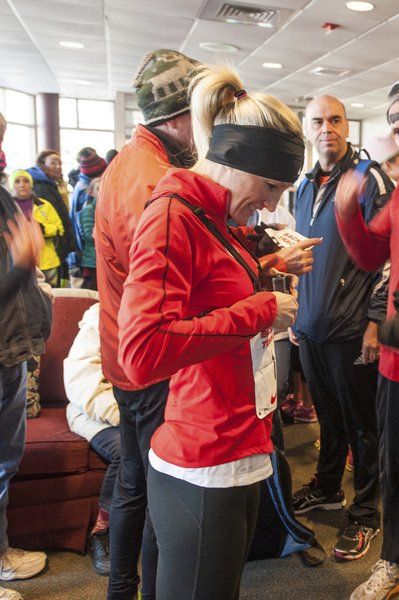 Marblehead native and three-time Olympian Shalane Flanagan adjusts the GoPro camera she wore while running the Back The Track 5K.