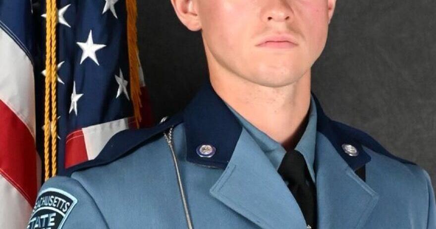 A solemn tribute: Fallen trooper escorted home by colleagues
