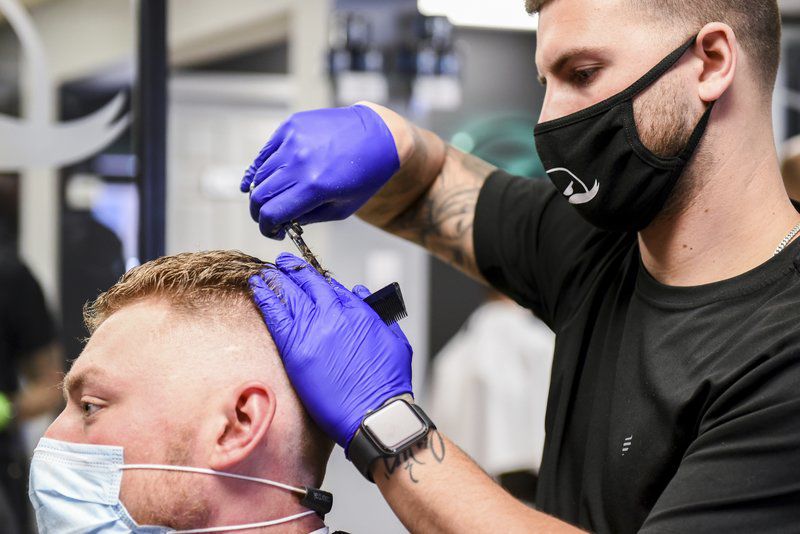 Local stylists, barbers make a cautious reopening Local News
