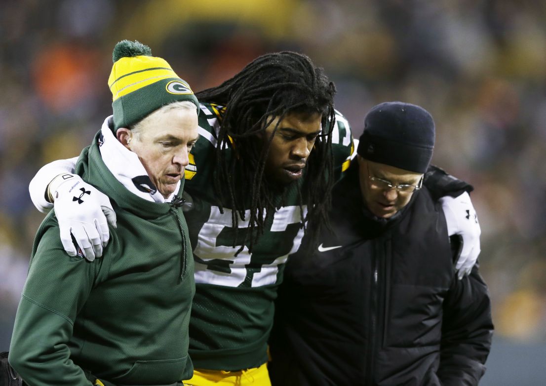 Green Bay Packers' Jamari Lattimore is helped off the field during the first half.