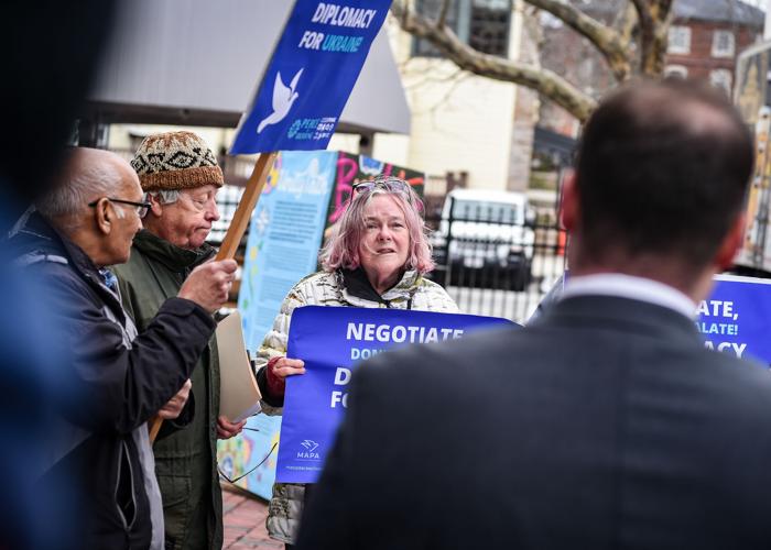 Massachusetts Peace Action members protest war in Ukraine outside Congressman Moulton’s office