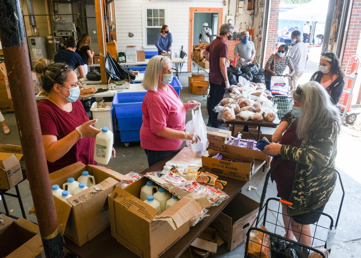 SLIDESHOW Congressman Seth Moulton volunteers at Salem Pantry popup