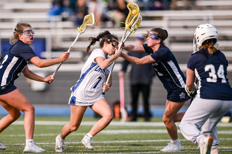 Bernard notches 100th career points, Generals pull away late at Danvers