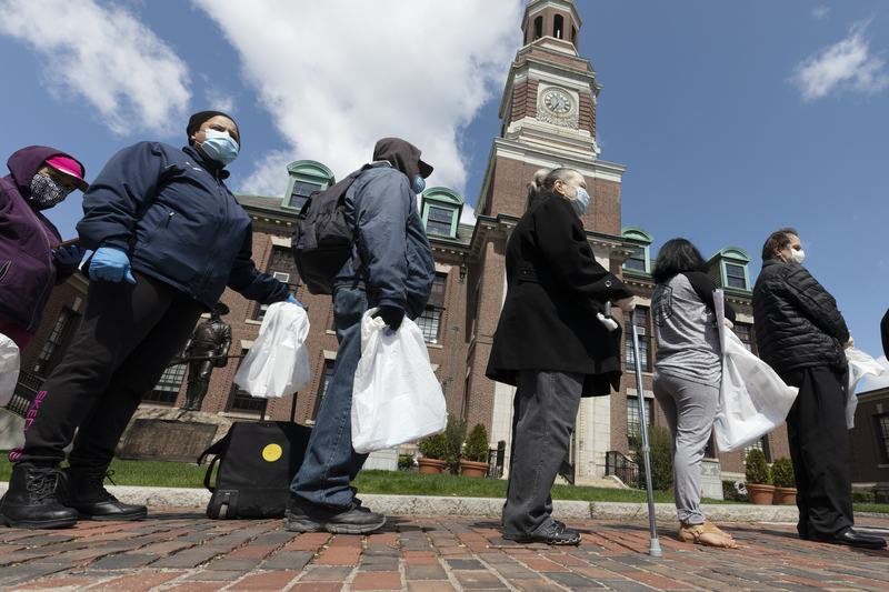 'People are hungry:' Virus takes toll on immigrant enclave