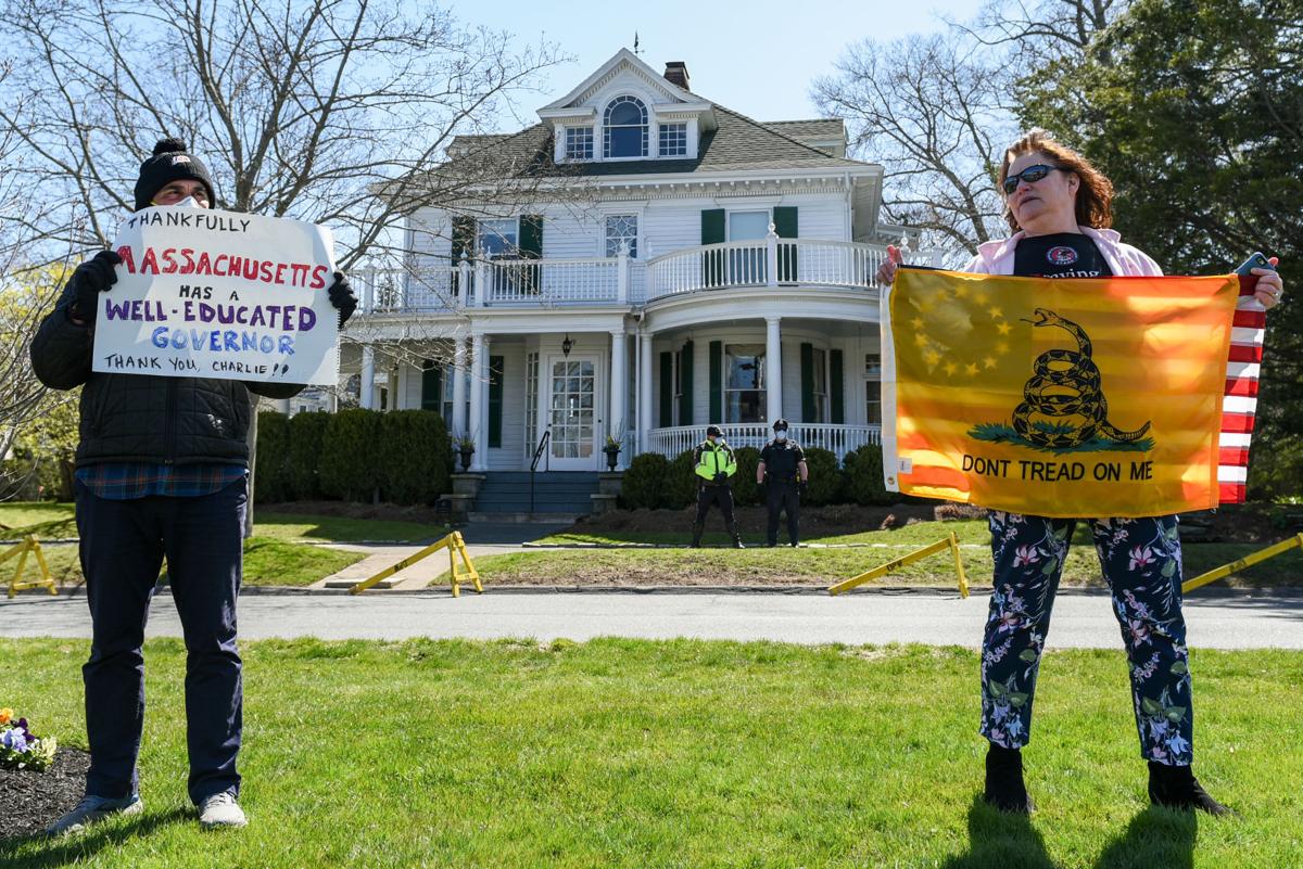 Protesters gather outside Gov. Charlie Baker's home in Swampscott