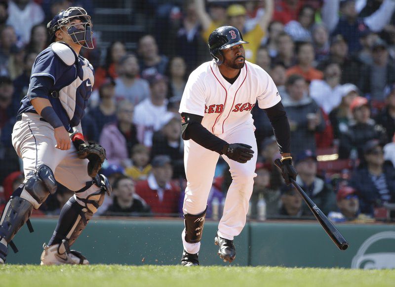 Boston Red Sox center fielder Jackie Bradley Jr. leaps up to catch