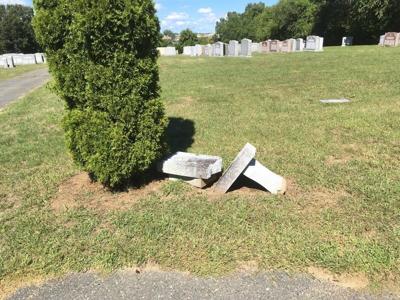 Police investigating damage to Jewish cemetery benches