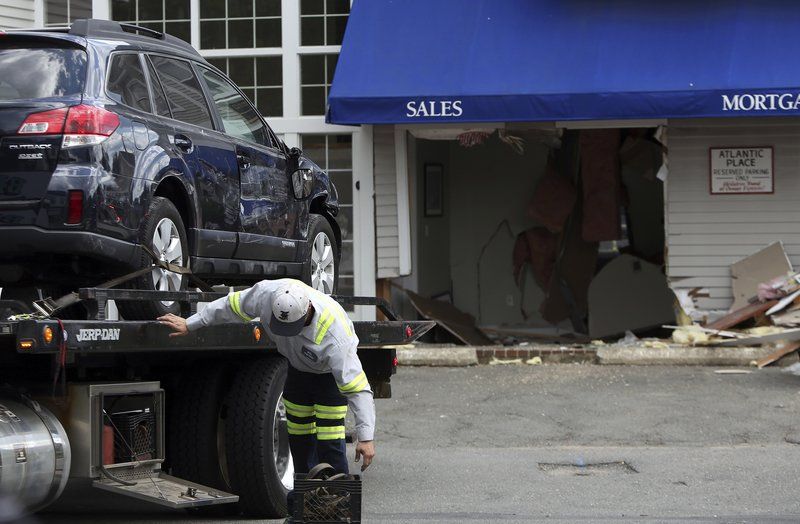 Car crashes into office building in Marblehead Local News