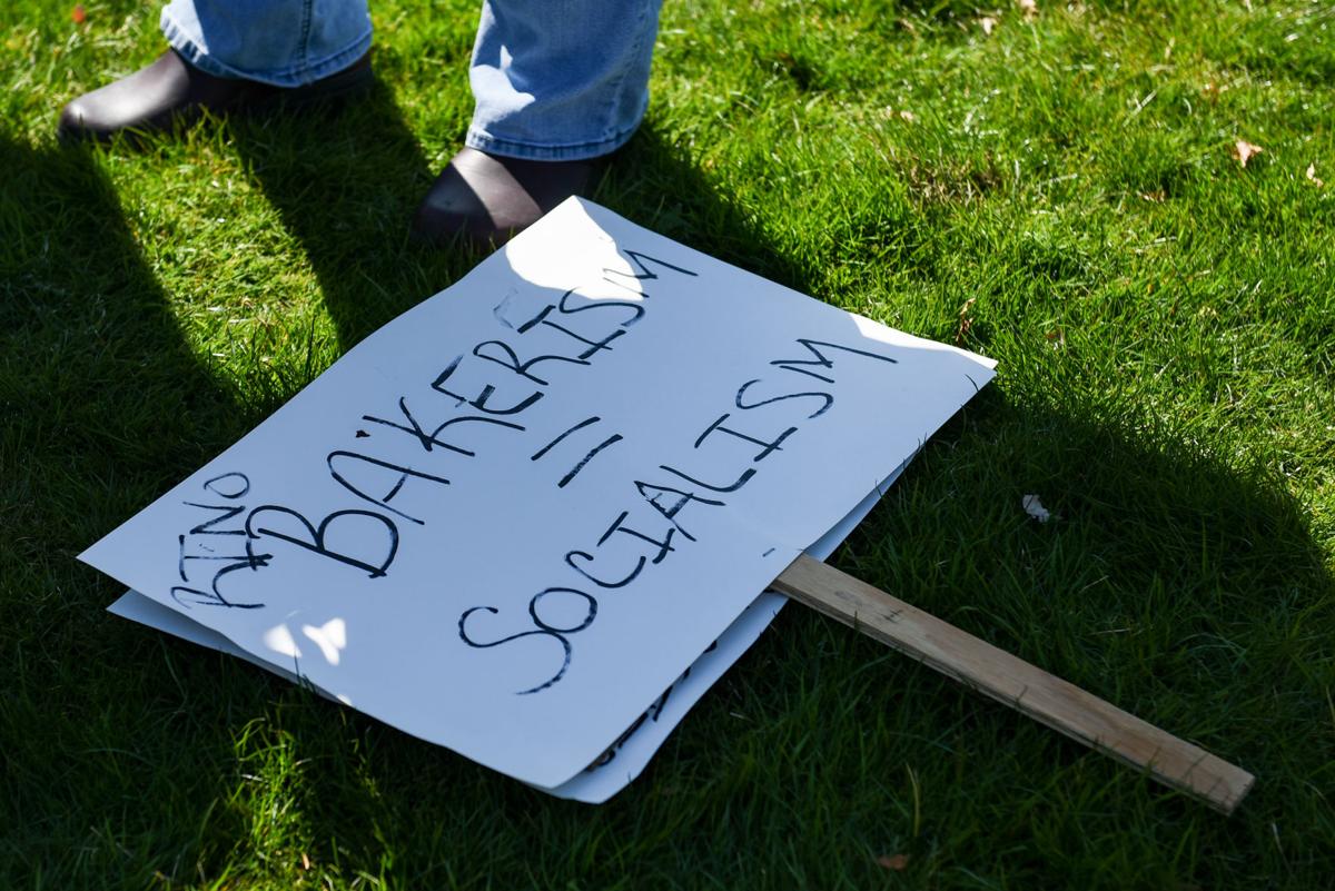 Protesters gather outside Gov. Charlie Baker's home in Swampscott