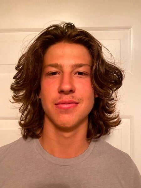 Trendy Hairstyles for Teenage Boys with Long Hair