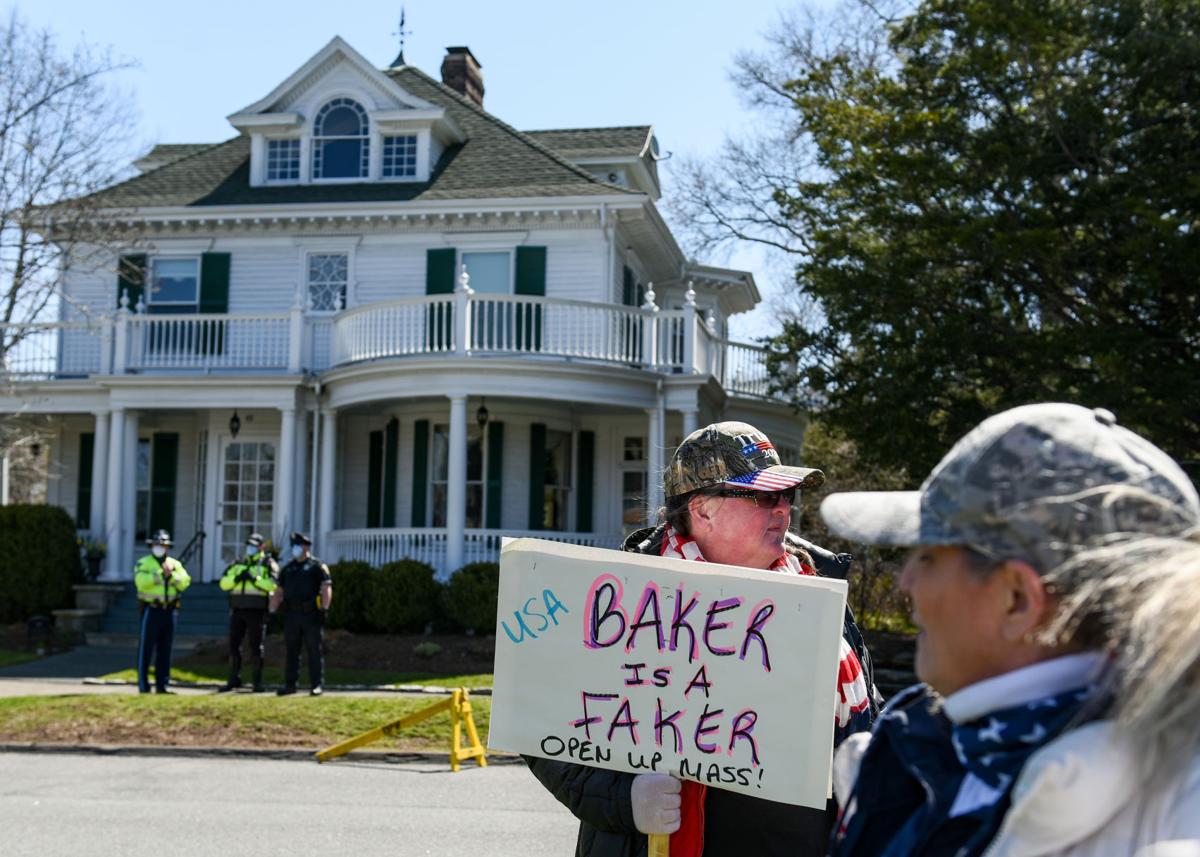 Protesters gather outside Gov. Charlie Baker's home in Swampscott
