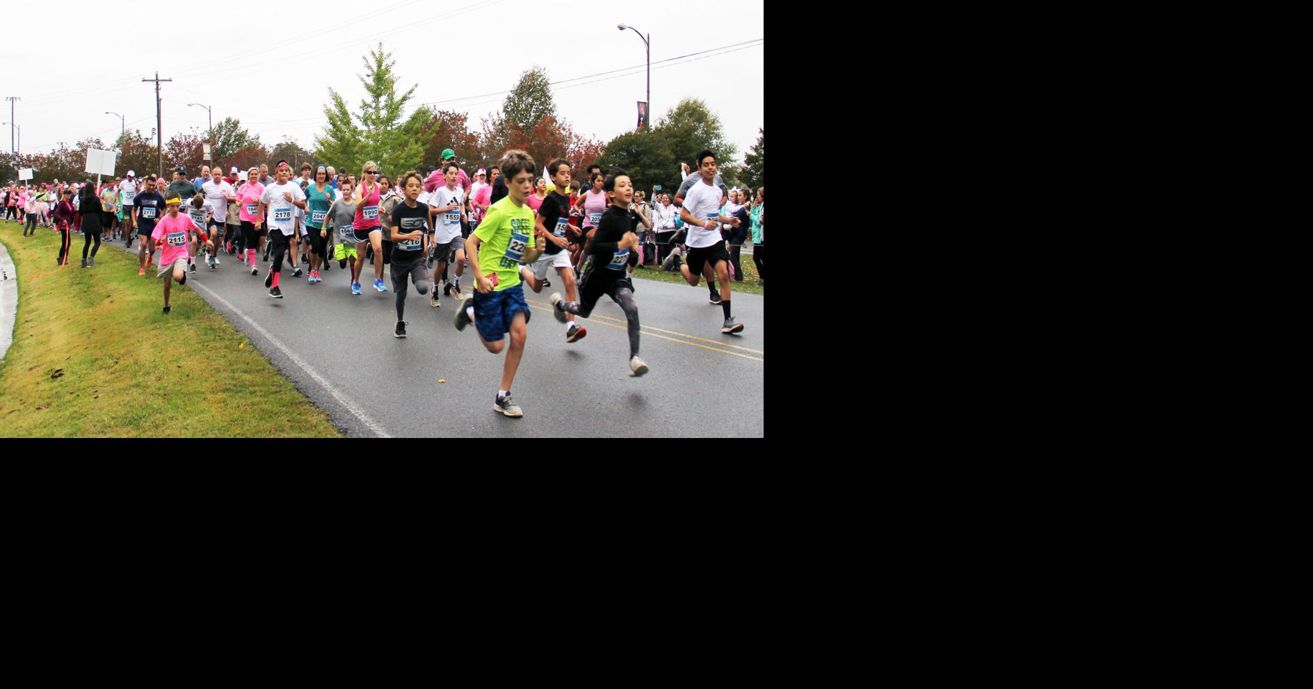 Hundreds pour in for Pink Pumpkin Run Marshall County celebrates