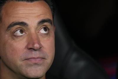 Xavi says Barcelona's improved play has been key to changing his mind ...