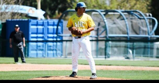 Hancock baseball team opens with a split at COS