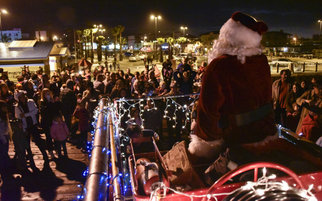 Pismo Beach rings in holidays with Santa, snow, singing Local News