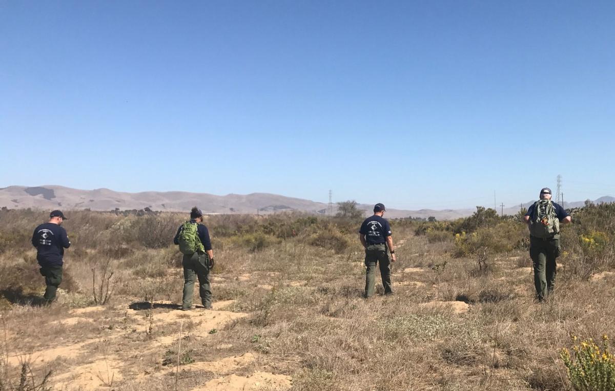 Santa Barbara County Sheriff's deputies search riverbed